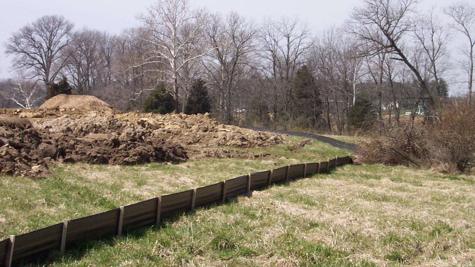 Silt fence installed as a sediment control barrier on a construction site