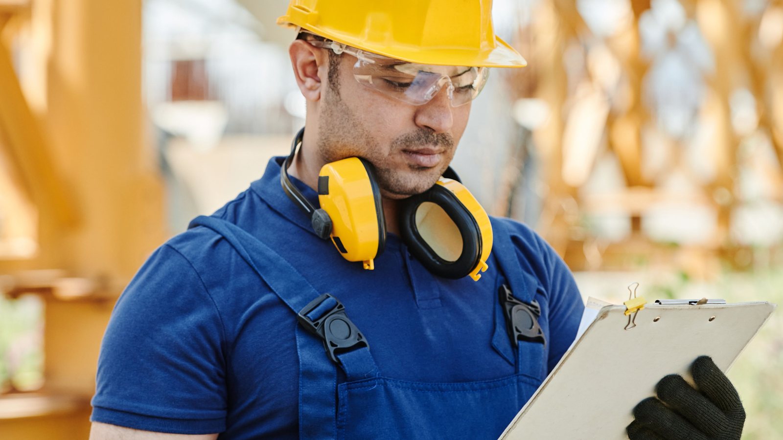 Construction specialists reviewing a question against project drawings