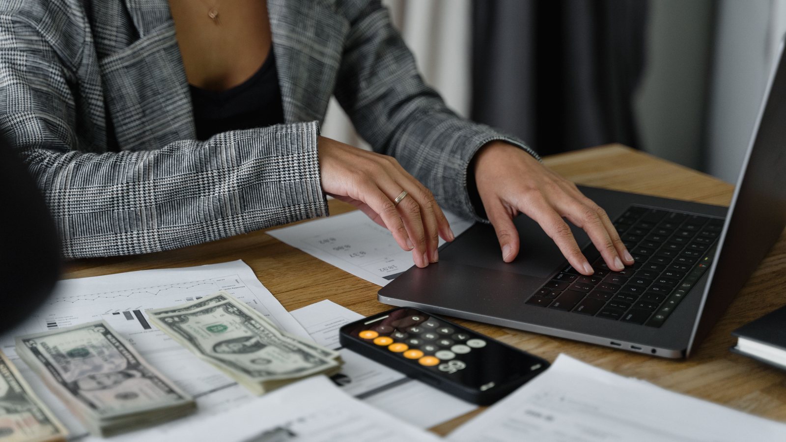 Developer reviewing a timed cash flow forecast and property settlement milestones